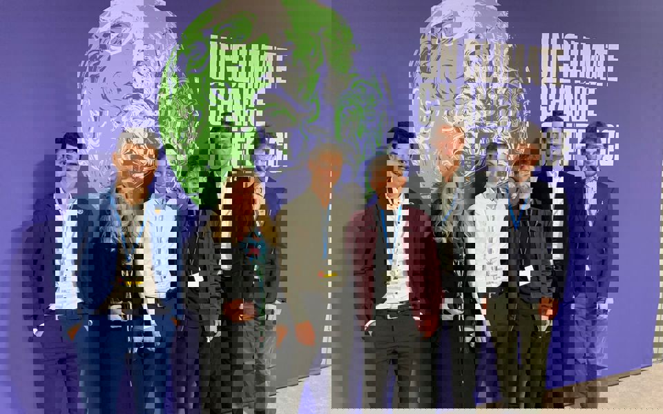 Alixis Balisman en photo de groupe lors de la conférence COP à Glasgow, 2021